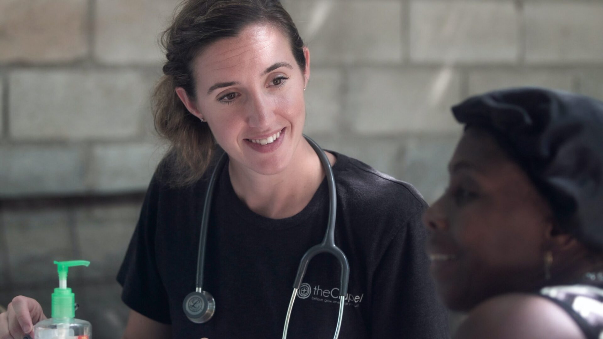 Two women are seated, one with a stethoscope, appearing as if she may be explaining different treatment options for eating disorders